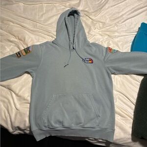 The North Face Men’s Pale Blue Pullover Hoodie with Patch Accents